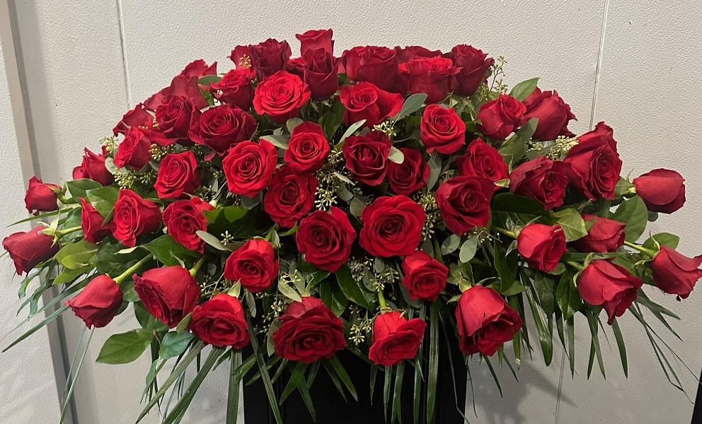 Red Rose Half Casket from Peters Flowers in New York City